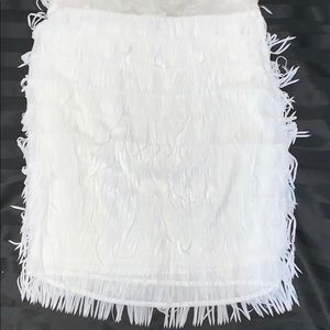A white swing (fringe ) skirt form NY&C